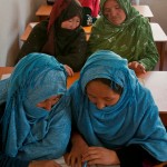 Bamiyan BAMYAN PROVINCE, Afghanistan - Middle-aged women study general education in a 1st grade class at the Arzu Studio Compound in Dragon Valley, west of the town of Bamyan. Women and children enrolled the program are employed as carpet weavers and receive higher-than average compensation for their work, and are required to attend literacy classes. They also have access to day care for their children, hot water to wash clothes, a kitchen, and a garden where they can grow their own vegetables and herbs. Younger children attend classes before and after weaving the rugs. (U.S. Army photo by Sgt. Ken Scar, 7th Mobile Public Affairs Detachment) - published in Bamyan Province emerges as a model for Afghanistan’s potential by rceast